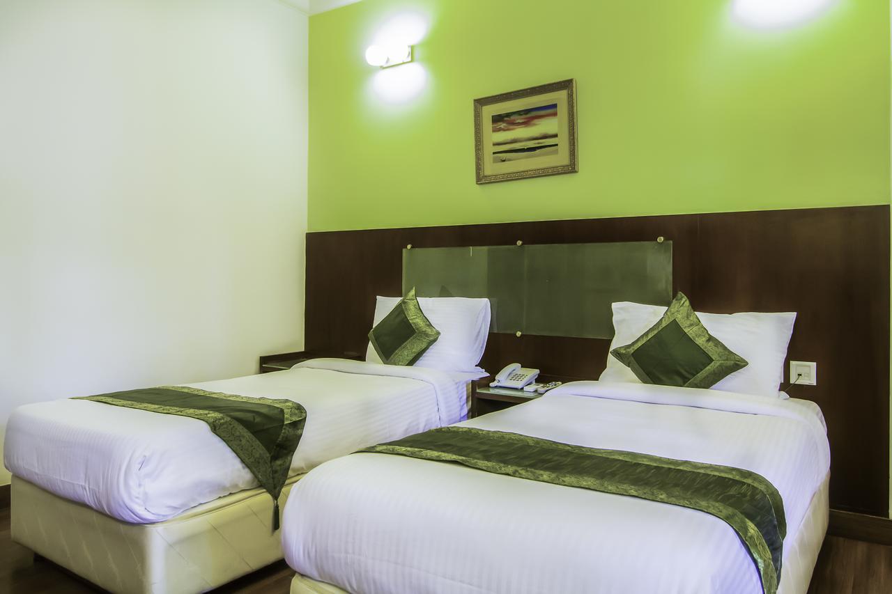 Treebo Angson Hotel Madras Buitenkant foto